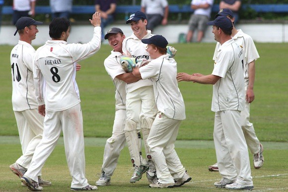 Jubilation in the St. Johnston camp as the Sion Mills wickets kept falling. Pic.: Gary Foy