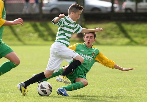 Conor Gavigan times his tackle to perfection against Celtic. Pic.: Gary Foy