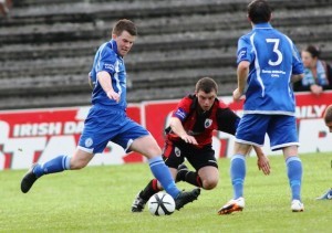 Gary Merritt sends a cross in from the Harps' left wing during the first half of their match against Longford Town at Finn Park tonight. Pic.: Gary Foy