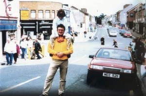 Gonzalo Cavedo poses for a picture just seconds before the car containing the Omagh bomb explodes behind him.
