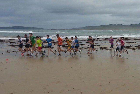 More than 60 members of Finn Valley AC hit the beach at Ballyliffin on Sunday