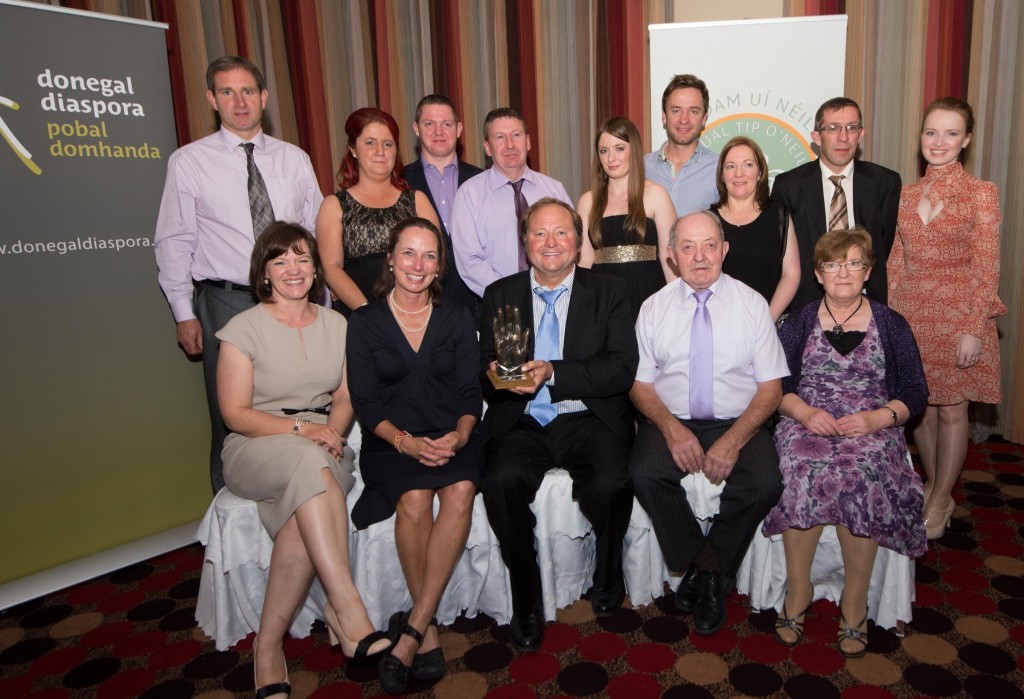 At the Tip O'Neill Award presentation are seated  Pauline Ferry, Nancy Scweitzer, Governor Brian Scweitzer, Tip O'Neill Diaspora Award recipient,  Michael Friel and  Josephine Friel. Back from left are Eamon Ferry, Dana Dawson, Adrian Friel, Aidan Quinn, Niamh Friel, Alan Friel, Anne Quinn, Colm Friel and Catherine Foley. Photo Clive Wasson