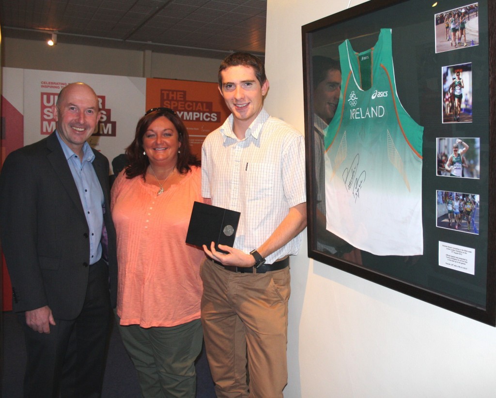 Myles Sweeney ,Anne Marie Ward and Brendan Boyce with his Participants medal for 2012 London Olympics.