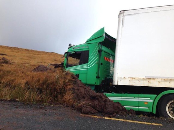 The truck left the road and became embedded on the Errigal Road.