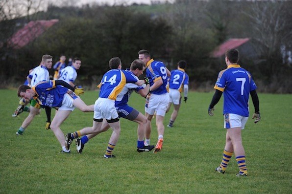 Anthony Thompson faces three St Pats Drumcondra forwards as he attacks opens up another Letterkenny IT attack. Letterkenny IT won by a score of 12 -9. (photo Paddy Gallagher).