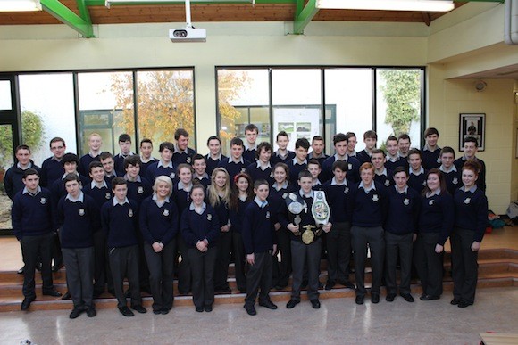 Damien celebrates his World Title with his classmates