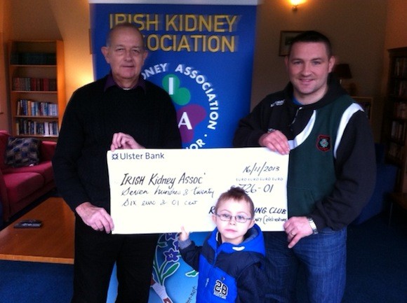 Anthony RYan, from the Irish Kidney Association, accepts the cheque from Gary McCullagh.