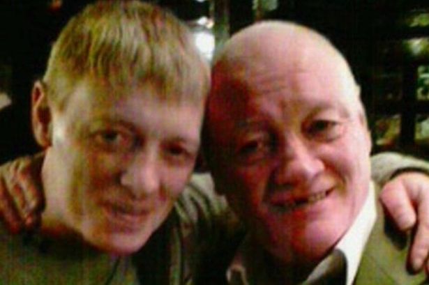 John Jnr, left, pictured with his dad on a previous visit to the same bar