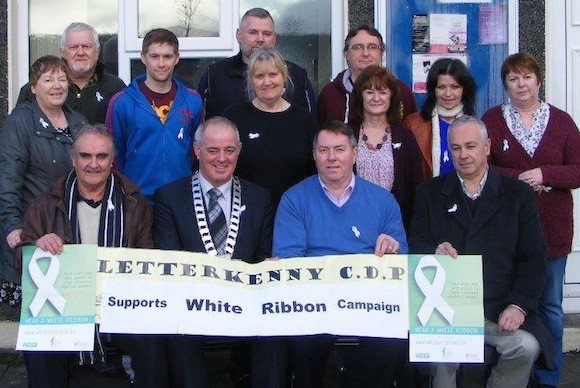 Mayor Paschal Blake and Cllr Gerry Mc Monagle with the Staff and Voluntary Mangement of Letterkenny CDP supporting the White Ribbon Campaign 