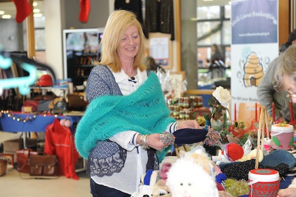 Aoife McDonnell, Cara House, Market Square, Letterkenny pictured at the LyIT Christmas Fair with handmade knitwear and hand made baby clothing among the many items on display at the Cara House display stand. The Fair is organised by the Student Union in LyIt and will support student families who are in need at Christmas. (photo by Paddy Gallagher).