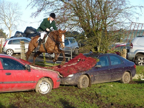  Donegal & Tyrone huntsman Simon Scott over the “Christmas Car” novely jump