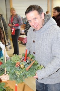 John McClean pictured at the LyIT Christmas Fair where he hopes to sell some Yule Tide logs and Cristmas Wreaths.  The proceedsof the Fair at LyIT will go towards assisting the families of students at Christmas time.
