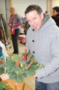 John McClean pictured at the LyIT Christmas Fair where he hopes to sell some Yule Tide logs and Cristmas Wreaths. The proceedsof the Fair at LyIT will go towards assisting the families of students at Christmas time.