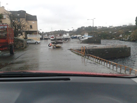 The scene at Bunbeg pier - a boat tossed onto the quay Pic Neil Campbell