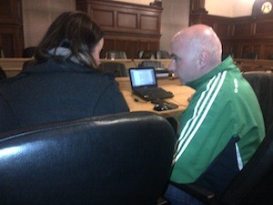 Cllr John Campbell discusses the budget with Cllr Marie Therese Gallagher
