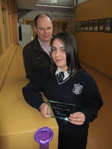 Chloe with teacher Declan Docherty and her award!