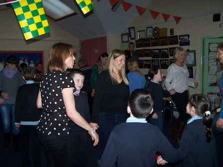  European teachers are taught to set dance by Ms. Mc Kenna Clarke and the pupils from 4th and 5th classes.