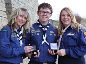 Lifford Venture Scout Christopher Kelly who received his Chif Scouts Award from Scouting Ireland's Chief Scout, Michael John Shinnick at a  presentation day in the O'Reilly theatre, Dublin.  Christopher was one of three from Donegal to have achieved this award. Included in photo is christopher's mentor Cathereen Wells Doherty  and proud mum Grainne.   (NWNewspix)