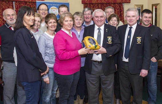 PIC. CAPTIONS: 1A: Letterkenny Golf Club President Barry Ramsay presenting the club's new defibrillator to lady member Anne Condon who spearheaded the collection of mobile phones to trade for the device. Also pictured are Lady Captain Catherine Cooke-Harkin and Club Captain Tom Mc Donagh. 