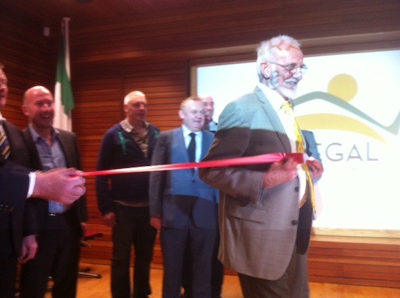 Danny McDaid runs through the tape to mark the official launch of the Donegal Marathon 2014 this evening.