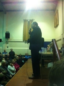 An emotional Tom McKean, nephew of Suzy and Isa Arthur, speaks at the meeting. 