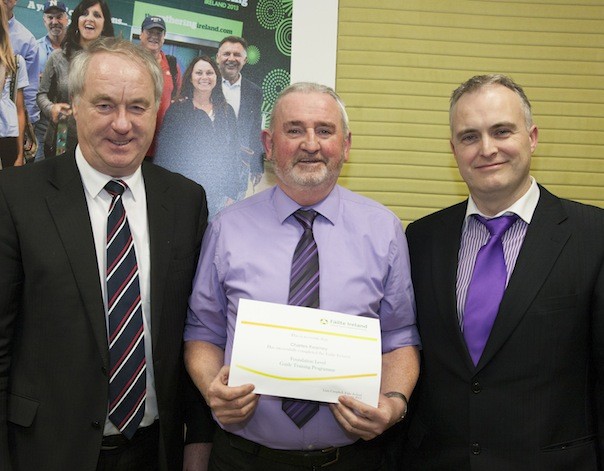 Charlie Kearney (middle), John McGinley Coach Hire, Letterkenny is pictured receiving his certificates from Tony Lenehan, Fáilte Ireland having completed a foundation in Guiding Skills, also pictured is  CTTC Chairman, James McGinley, Letterkenny.  [Photo: Derek Cullen, Fáilte Ireland]