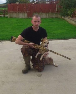 Mark Dowds with the camouflaged rifle which was a given to him by his father.  (NW Newspix)