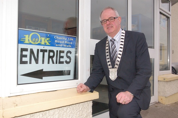 Letterkenny Mayor Paschal Blake pointing the way to entries for this year's North West 10K which starts at 2pm.