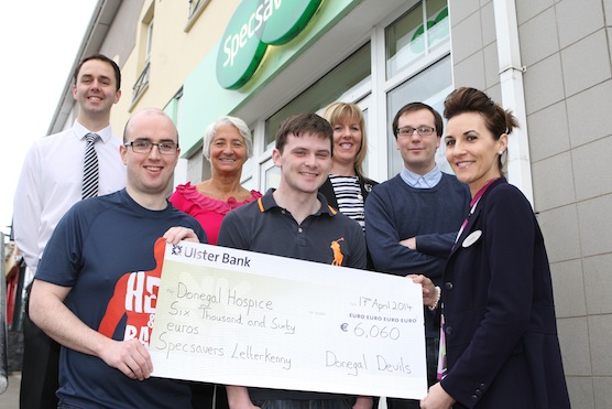 Staff from the Specsavers including Liam Ward (event organiser) Brian Boyce, Gary Cassidy, Aidan Spence, Lorraine Gildea (Event organiser). of Donegal Devils pictured with Isobel Rodgers and Grace Boyle from The Donegal Hospice pictured at the presentation of the cheque for over €6,000 Photo Brian McDaid