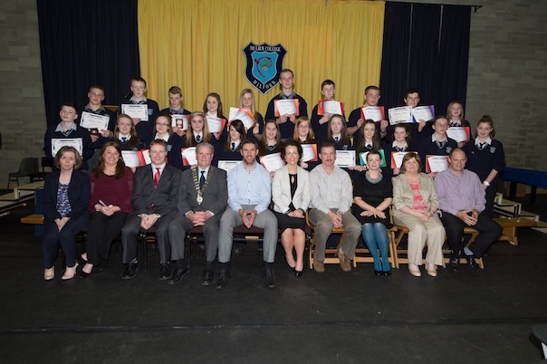 Third year students who received awards at the Mulroy College prize giving on Thursday night last with seated from left Odelle Callaghan, Nicola McBride, Martin Davis, Parmerica, Ian McGarvey, Donegal Mayor, Jason Black, guest Speaker, Fiona Temple,Principal, Eileen McGettigan, Caoimhe Beagley, Tony McCarry, Parents Committtee, Scatha Farrell, BOM, Catherine McHugh, Deputy Principal and Declan Doherty. Photo Clive Wasson.