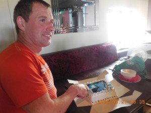 Diver Paul McCabe cuts his 44th birthday cake. He doesn't look a day over 43!