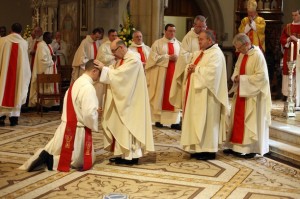 Fr Martin Chambers bless the newly ordained Fr. Gorman at St Eunans on Sunday. Photo Brian McDaid