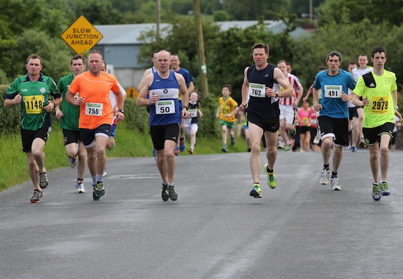 The leading runners enter Trusk Road at the start of the Sessiaghonell NS 5K Fun Run & Walk. Pic.: Gary Foy, newsandsportfiles