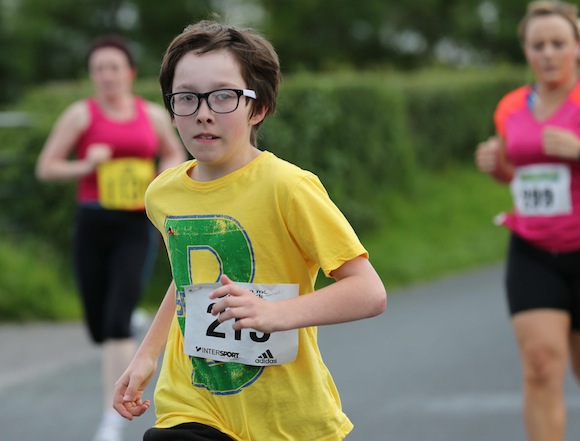 A young lad taking part in the Sessiaghoneill NS 5K Fun Run & Walk on Thursday evening. Pic.: Gary Foy, newsandsportfiles