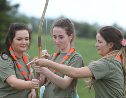 It takes three scouts to shot a bow during a demonstration of archery at the Beaver Scout Camp.  ((c) North West Newspix)