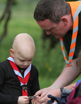 Beaver Scout Camp Chief Raymond Coll shows this young Killybegs Beaver Scout how to use a compass.  ((c) North West Newspix)