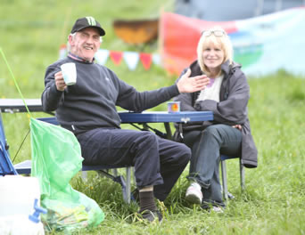 Two veteran Scouters Tony Smith (Killybegs) and Geradline Coughlin (Donegal Town) with more years service than they care to rememeber enjoying a relaxing camp. ((c) North West Newspix)