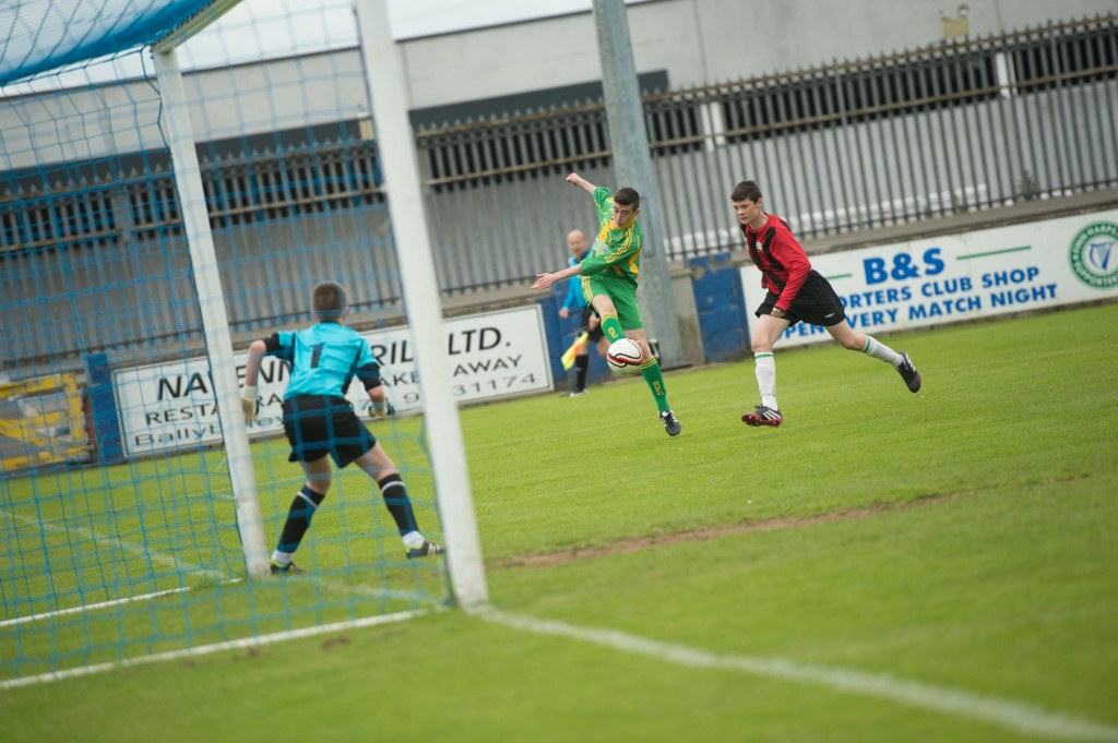 Bonagee's James Carolan has a shto  against St Catherines in the U14 Champions League Final-  Photo Clive Wasson