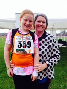 Gold for Emma Maloney in the U-11 Turbo Javelin and is pictured with proud mum Mary Grace
