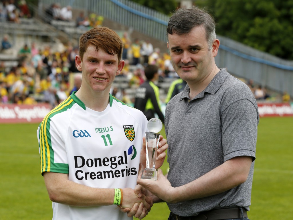 Lorcan O'Connor received his award from Patrick McCarney, Customer Relationship Manager, Electric Ireland after his star performance in his team's win over Antrim in the Electric Ireland Ulster Minor Football Championship. 