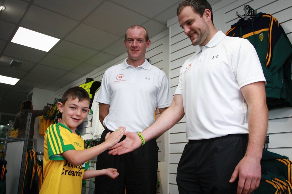 Fellow Glenswilly GAA Club member Shane Tinney (son of Paddy Tinney) tries to deal for the best price with Neil Gallagher and Micheal Murphy when he got a pre- opening tour of the new sport shop in Letterkenny today. Photo Cristeph Brian McDaid