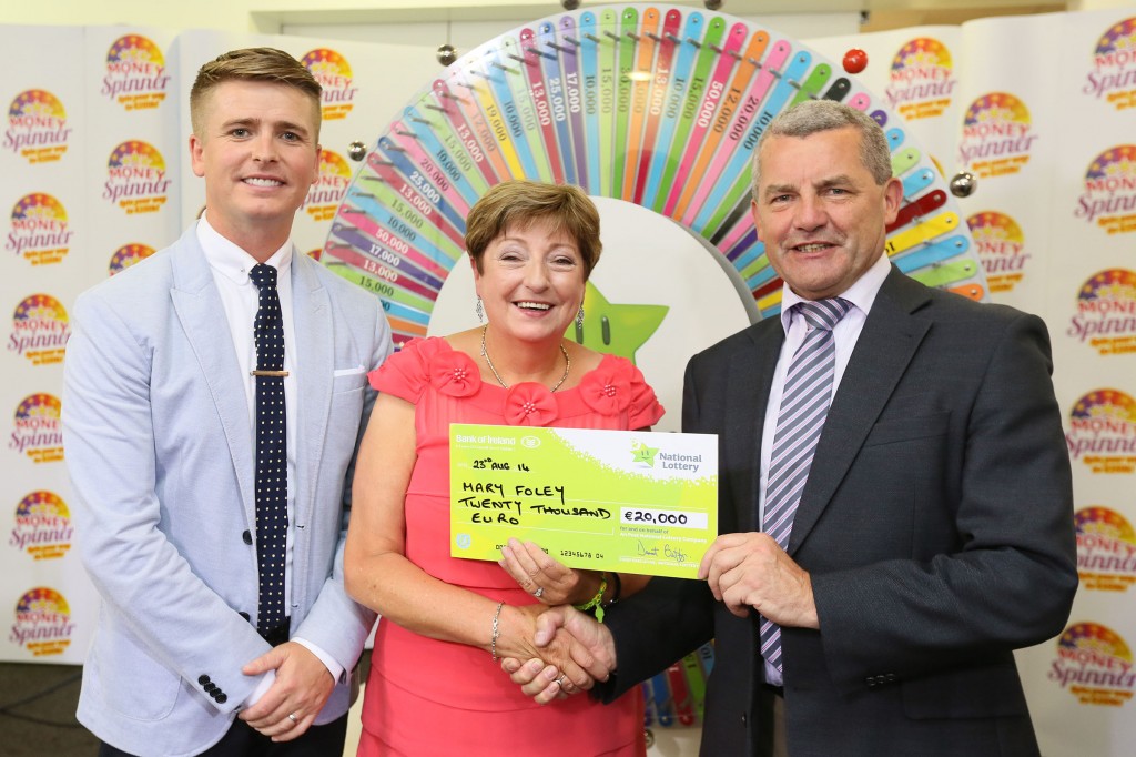 Pictured at the presentation of winning cheques were, from left to right: Brian Ormond, Money Spinner Host; Mary Foley, the winning player and Gerry O’Donoghue, The National Lottery. The winning ticket was purchased in Reidy’s Centra, Coyrig, Foynes, Co. Limerick.