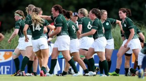 Ailis Egan celebrates scoring a try with teammates 1/8/2014