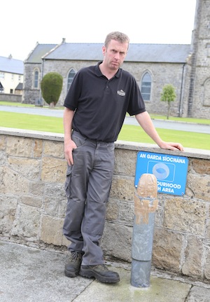 Colr Liam Doherty at the site of where a lamp post fell onto a parked car in Convoy. (North West Newspix)