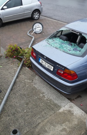 A fallen lamp post which damaged a parked car in the town of Convoy in Co. Donegal.  (North West Newspix)