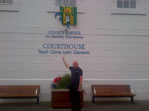Courts employee David Moen nails his colours to the mast!