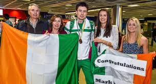 Family and friends greet Bronze medal hero Mark English following his arrival Dublin Airport 