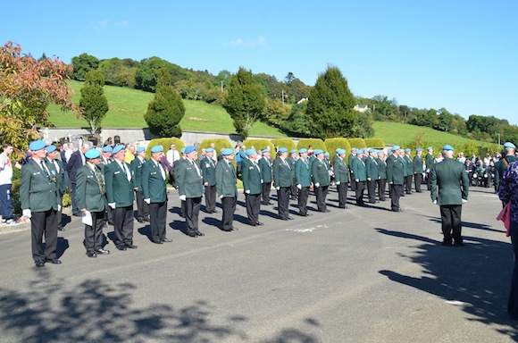 Former members of the Defence Forces stand to attention at Conwal Graveyard. Pics by Geraldine Diver.