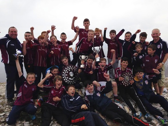 The Termon U12 squad and mentors on summit of Errigal
