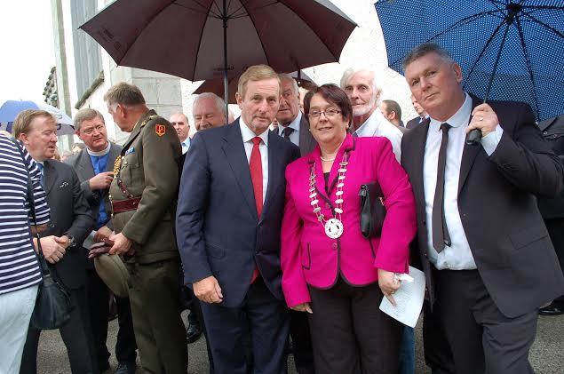 An taoiseach Enda Kenny with Donegal Town Mayor; Patricia Callaghan and husband Vincent at the graveside